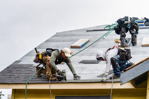 Professional Gutter Installation technician working in Elbe, WA